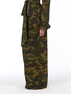 Our utility camo skirt ticks all the non-negotiables of its workwear heritage – comfort, durability, ease of movement – with elevated design and shaping details. The slimming effect of the v-waistline is repeated in contour seaming, an adjustable waist preference, and a center back slit. Camo Collection Imported 97% Cotton, 3% Spandex Pocket Lining: 100% Polyester Model wears size X-Small This item is lined True to size Army Fatigue Skirt Outfit Black Women, Camo Dress Outfit, Camouflage Fashion, Army Fatigue, Safari Chic, Camo Skirt, Camo Dress, Camo Fashion, Fall Dress Outfit