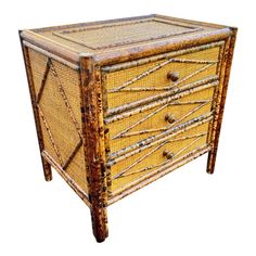 an old wooden chest with drawers made out of wood and rattan, isolated against a white background