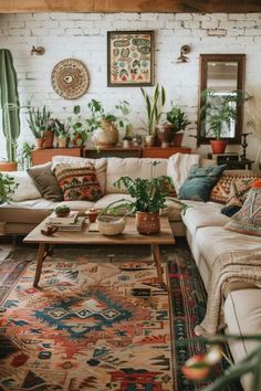 a living room filled with lots of furniture and plants on top of a wooden table