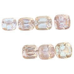 four different colored diamonds on a white background