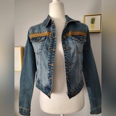 Add A Touch Of Bohemian Style To Your Wardrobe With This Beautiful Forever 21 Cropped Denim Jacket In Size Small. The Jacket Features A Solid Blue Color, Button Closure, And Decorative Pockets That Add A Touch Of Elegance To The Jacket. Made Of Polyester And Spandex, The Outer Shell Material Is Soft And Comfortable To Wear All Year Round. Forever 21 Size Small Color Blue Style Cropped Closure Bottom Polyester ,Spandex, Cotton Shoulder To Down 18 Inch Armpit To Armpit 17 Inch Long Sleeves 23 Inch Forever 21 Denim Jacket In Medium Wash For Fall, Forever 21 Medium Wash Denim Jacket For Fall, Forever 21 Medium Wash Denim Jacket For Spring, Forever 21 Denim Jacket For Fall, Forever 21 Denim Jacket For Spring, Forever 21 Fall Denim Jacket, Forever 21 Blue Denim Jacket, Trendy Forever 21 Denim Jacket, Forever 21 Denim Jacket For Winter