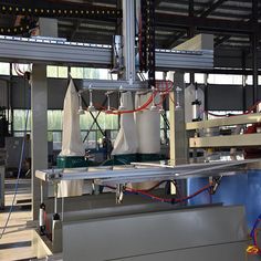 a machine that is making bags in a factory