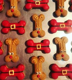 some cookies are decorated like dogs and bones