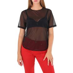 Wolford Ladies Tops. Fashion category: Shirts & Blouses. SKU: 52677-7005. Color: Black. Wolford Ladies Black Loose Fit Tulle Shirt. A Wolford shirt with a lightweight and loose-fitting tulle featuring a longer-cut back, loose fit, short sleeves and decollete and seams trimmed with tulle. Materials: 81% Polyamide, 19% Elastane. Made in Austria. Black Stretch Polyamide Tops, Polyamide Tops For Night Out In Summer, Summer Polyamide Tops For Night Out, Chic Polyamide Tops For Spring, Sheer Short Sleeve Tops For Evening, Sheer Polyamide Tops For Spring, Black Polyamide Tops For Evening, Sheer Casual Blouse For Night Out, Sheer Tops For Summer Workwear