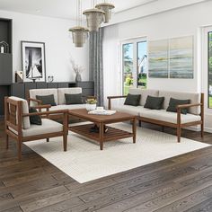 a living room filled with furniture on top of a hard wood floor covered in white rugs