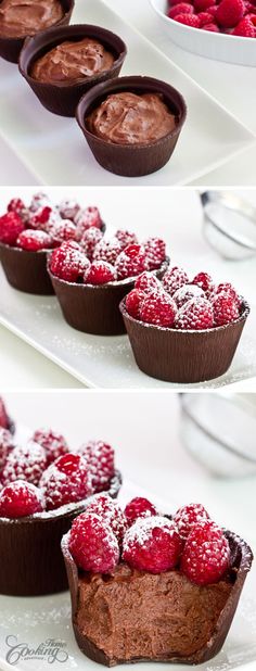 chocolate tarts with raspberries and powdered sugar on top are ready to be eaten