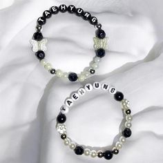 Two different types of bracelets, one with black rounded letter beads and one with white rounded letter beads. These are customizable! Whatever Bias name you want! Choose from one or both bracelets! you can also add on the all white beaded bracelet or all black beaded bracelet as well to pair everything together! Trendy Black Bracelets With Letter Beads, Trendy Black Beaded Bracelets With Letter Beads, Trendy Beaded Bracelets With Letter Print, Trendy Stretch Bracelet With Letter Print Beads, Trendy Stretch Bracelet With Letter Print And Round Beads, Trendy Black Jewelry With Letter Print, Casual Black Stretch Bracelet With Letter Beads, Trendy White Beaded Bracelets With Letter Print, Trendy Personalized Black Bracelet