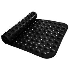 a black mat with holes on it