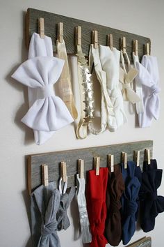 there are many different types of clothes hanging on the wall