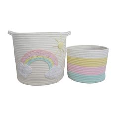 two white baskets with rainbow designs on them