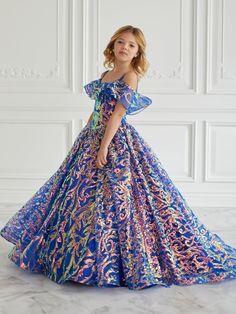 Your sweet girl will light up the room in this sequin print long cold shoulder dress with A-line skirt by Tiffany Princess 13668. This cold shoulder ball gown features a ruffled neckline off the shoulder with straps, fully sequins A-line skirt with side pockets, and a lace-up back. House of Wu Tiffany Princess Collection Spring 2022 Style Number: 13668 Fabric: Sequins Colors: Royal Blue, Sky Blue Sizes: 2, 4, 6, 8, 10, 12, 14, 16 Occasions: Pageant, Flower Girl, Mini Quinceanera, Formal Event, W Cold Shoulder Gown, Girls Long Dresses, Military Ball Dresses, Girls Formal Dresses, Illusion Dress, Sweetheart Dress, Pageant Dress, Junior Bridesmaid Dresses, Pageant Dresses