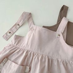 Charm in simplicity 🌸! Perfect for sunny days, this adorable Girls Solid Suspenders Dress keeps your little one comfy and stylish. A delicate lace trim adds a touch of elegance to the breathable cotton, mid-calf A-line cut. Ideal for ages 1-6, it's a summer staple! #CuteKidsFashion #SummerDress Specifications: Age Range: 1-6 years Season: Summer Gender: Girlsdr Material: Cotton Dress Length: Mid-Calf Style: Cute Department Name: Children Collar: Square Collar Sleeve Style: Regular Pattern Type: Solid Silhouette: A-Line Sleeve Length: Sleeveless Fit: Fits true to size, take your normal size Decoration: Lace Suspenders Dress, Spring Cotton Sundress For Babies, Toddler Collared Dress, Pink Toddler Summer Dress, Lace Pocket, Cute Kids Fashion, Suspender Dress, Girls Blouse, Romper Outfit