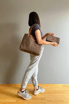 "BAG NAME : MILETOS COLOR : COFFEE BROWN ::ATTRACTIVE PRICE:: The MILETOS tote is all you need for those minimalistic days. It's perfect for holding your phone, keys, wallet, book and an iPad -- basically the most important part of your life. Our waxed canvas totes were created using the finest cotton canvas. Get it in a small or large (please ask me). ::MATERIALS AND FEATURES:: Waxed canvas Vegetable tanned leather straps Silver color Rivets An outside big slim pocket Two interior slim pockets Macbook Pro Bag, Wax Canvas, Canvas Totes, Waterproof Tote, Bag Names, Color Coffee, Medium Tote, Coffee Brown, Waxed Canvas