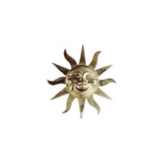 a metal sun with two faces on it