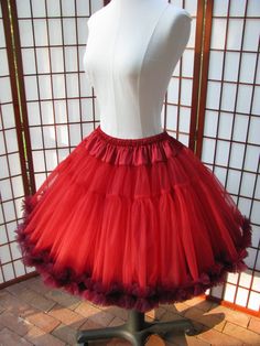 "This listing is for a custom order for a super-full double layer nylon organdy petticoat with satin waist and chiffon bottom ruffles. The pictured petticoat was designed for a 26.5\" (67,3 cm) waist and is 20\" (50,8 cm) long. It is displayed on a dress form with a 22\" (55cm) waist. You can choose any length you need. I will lengthen each of the tiers to achieve extra length. If you would prefer that I add another tier to achieve extra length, then the price will increase substantially. If you Party Organza Petticoat With Ruffles, Organza Petticoat With Ruffles For Parties, Tulle Petticoat With Ruffled Skirt For Costume Party, Tulle Ruffled Petticoat For Costume Party, Ruffled Tulle Petticoat For Costume Party, Party Petticoat With Ruffles In Crinoline, Elegant Tulle Petticoat With Ruffles, Fitted Organza Petticoat With Ruffles, Red Full Skirt Petticoat For Party