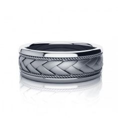 a men's wedding band with an intricate braid pattern on the inside of it