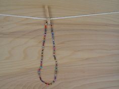 assorted glass beaded choker made 14 inches in length stretchy string to fit many sizes custom lengths available Essential Oil Perfume, Beaded Necklaces, Beaded Choker, Miami Fl, Star Necklace, How To Make Beads, Peppermint, Etsy App, Selling On Etsy