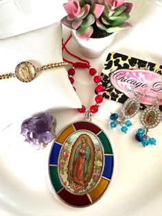 OUR LADY of GUADALUPE set. 3 pieces set. Earrings. Car charm. Bracelet. Adorable set ready to gift. Mom. Mother's Day. Sisters. Bff. Faith  beautiful gift set for someone special in your life or keep it to yourself  believe 💖 pray 💜 Nuestra Senora de Guadalupe 💜 Virgen de Guadalupe  you will receive exactly the 3 items in the picture.  shipping USA 🇺🇸 only. Spiritual Dangle Charms For Gifts, Mother's Day Adjustable Jewelry Sets Gift, Mother's Day Gift Adjustable Jewelry Sets, Adjustable Spiritual Jewelry Sets For Gifts, Multicolor Dangle Jewelry For Gifts, Nickel Free Spiritual Jewelry And Charms For Gifts, Nickel-free Spiritual Jewelry And Charms For Gifts, Adjustable Multicolor Jewelry Sets For Gifts, Multicolor Dangle Jewelry For Valentine's Day