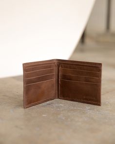 Classic leather wallet with pockets for credit cards and cash. Handmade in an ethical factory we own and operate in Peru. | Men's Brewer Wallet Brown Leather Nisolo Online Eco Friendly Cookware, Nisolo Shoes, Holiday Gift Card, Leather Products, Classic Leather, Gifts For Men, Leather Working, Credit Cards, Types Of Shoes