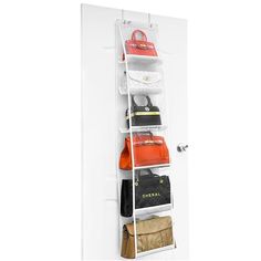 an over the door storage rack holds bags and purses