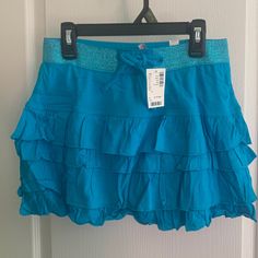 Built In Mini Shorts Underneath Skirt Justice Light Blue Skirt Nwt Light Blue Skirts, Glitters Skirt, Purple Leopard Print, Purple Jeans, Red Trench Coat, Crochet Halter Tops, Spring Jackets, Girls Denim, Mini Shorts