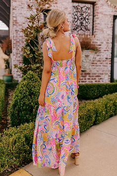 - Get a resort ready look with this vibrant maxi! - Colorful material with a paisley print - A built-in partial lining ending above the knee - A square cut neckline - 1.5 inch tie closure straps - A smocked upper back - Hidden side pockets - A flowy silhouette that ends in a rifle maxi length hemline Beach Maxi Dress With Tie Straps And Square Neck, Pink Sundress With Square Neck, Pink Square Neck Maxi Dress For Day Out, Multicolor Paisley Print Maxi Dress For Vacation, Beach Maxi Dress With Tie Back And Square Neck, Pink Square Neck Maxi Dress For Vacation, Summer Paisley Print Maxi Dress For Beach, Summer Beach Maxi Dress With Paisley Print, Paisley Print Summer Maxi Dress For Beach