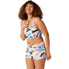 This bikini top is great for wearing on active days at the beach. We're prepared for a surprise volleyball match thanks to this top's dialed-in, supportive fit with adjustable straps and hidden underwire. Its full-coverage cut is similar to that of a retro crop-top, so we're happy to wear it into town when we're done playing at the shore. White Sports Swimwear With Built-in Bra, Summer Beach Activewear With Built-in Bra, Summer Tankini For Sports And Beach Season, Sporty Beach Tankini With Built-in Bra, Playful Summer Gym Activewear, Playful Summer Activewear For Gym, Sports Tankini With Built-in Bra For Beach Season, Multicolor Summer Workout Swimwear, Summer Multicolor Workout Swimwear