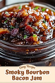 smoky bourbon bacon jam in a glass bowl with the words easy recipe smokey bourbon bacon jam