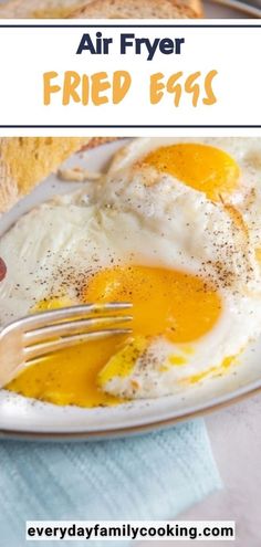 fried eggs on a white plate with a fork and bread in the background text reads air fryer fried eggs