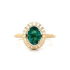 1.32 Carat Oval Cut Tourmaline Ring in 14k Yellow Gold This 14 karat yellow gold solitaire ring features a striking 1.32 carat oval-cut tourmaline, showcasing a vibrant blue-green hue. Set securely in prongs, the stone's color is further emphasized by a fluted halo that adds a distinct, textured detail to the design. With its refined balance of artistry and simplicity, this ring is a fun and elegant piece that can easily be worn everyday. PRIMARY STONE Stone: Tourmaline Shape: Oval Weight: 1.32 Engagement Ring Style Guide, Ring Style Guide, Jewelry Style Guide, Yellow Gold Solitaire Ring, Wedding Band Styles, Yellow Gold Solitaire, Platinum Rose Gold, Gold Solitaire Ring, Sapphire Solitaire