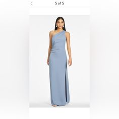 a woman in a blue dress is on sale