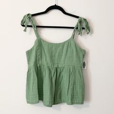 Loose Fit | Straps Untie Completely For Adjusting And Bow Placement | Brand New | With Tags Bundle & Save With Discount! Accept Offers Green Cotton Camisole For Vacation, Green Cotton Camisole, Green Cotton Summer Camisole, Green Tops With Tie Straps For Day Out, Green Cotton Camisole For The Beach, Green Cotton Camisole For Summer, Green Sleeveless Top With Tie Straps, Spring Green Cotton Camisole, Green Cotton Tops With Tie Straps