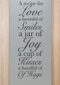 a framed sign that says, a recipe for love is a spoonful of smiles