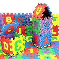 colorful puzzle pieces with letters and numbers on them