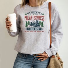 Polar Express Family Vacation,Best Holiday Christmas,Christmas Gift For Family,Polar Express Sweatshirt,Xmas Sweatshirt,Holiday Hoodie A thoughtful gift for a friend, family member, or loved one, or a treat just for you. Keep them close to your heart and wear your love on your sleeve. Your loved one will without a doubt treasure this thoughtful and reasonably priced gift. HOW DO I ORDER? -Please ensure that you have read all sizes and selected the color that best suits you. -Select the options that you want from the dropdown menu. -Add to cart and proceed to checkout. ORDER PROCESS - Typically, processing takes 1-3 business days. But I'll try to have it completed on the same day. - Shipping is first class, usually 1-5 business days, depending on the location. But majority of the time arriv Polar Express Sweatshirt, Polar Express Shirts, The Polar Express Movie, Polar Express Movie, Polar Express Train, Christmas Gift For Family, The Polar Express, Holiday Hoodies, Polar Express