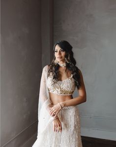 Verona is a stunning ivory with lehenga with touches of gold and pink, adorned with sequins, stones, pearls, and tassels all over. The blouse is delicately crafted with three-dimensional flowers and straps with pearls. DELIVERY TIMEPlease allow 12-16 weeks for your outfit to arrive. FABRIC DETAILSNet Professional cleaning only. Latest Bridal Lehenga Designs, Bridal Lehenga Designs, Latest Bridal Lehenga, 16 Weeks, Gold And Pink, Lehenga Designs, 12 Weeks, Touch Of Gold, Professional Cleaning