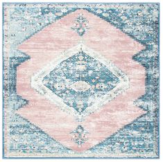 a pink and blue rug with an ornate design