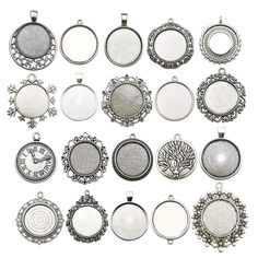 many different types of pendants on a white background