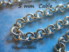 an image of a chain that has been cut in half and is labeled 5 mm cable