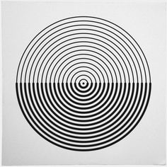 a black and white circular design on paper