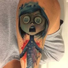 a person with a weird tattoo on their arm