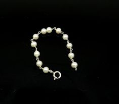 925 sterling silver customized solid silver pearls baby bracelet, excellent gift for new born baby, stylish jewelry from india.Metal-925 sterling silver.Item type-Baby braceletLength-4.5 inches.pearl size-5 mm approx.Weight-3.140 grams.Stamped-925.Makes excellent gift for baby, birthday, Christmas day. Flexible Bracelet, Exotic Jewelry, Adjustable Bangle Bracelet, Baby Pearls, Pearl Bangle, New Born Baby, Baby Bracelet, Baby Jewelry