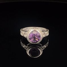 * Sterling Silver ring with Amethyst * The face of this ring measures 11mm X 11mm * This ring is size 7. * You will receive the exact ring pictured. Purple Crystal Ring With Halo Setting, Classic Purple Round Signet Ring, Purple Ring With Center Stone, Purple Amethyst Round Signet Ring, Purple Amethyst Signet Ring, Sterling Silver Purple Ring With Vs Clarity, Sterling Silver Purple Rings With Vs Clarity, Classic Round Purple Crystal Ring, Classic Purple Crystal Round Ring