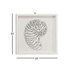 a white frame with a silver object in it and the measurements for each item below