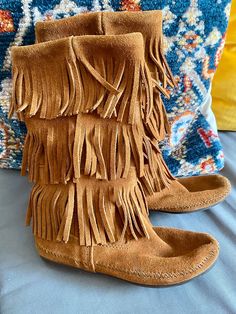 Brown Minnetonka mid calf fringe moccasins boots nice condition!  size 8 approx: 10" outside toe to heel 12 1/2"high 13 1/4" inside top of boot diameter NO REFUNDS or EXCHANGES. Please contact us if there is any concern with your purchase..if for any reason a refund is agreed upon , return shipping cost will be buyers responsibility.. No exceptions Suede Fringe Boots With Closed Toe, Bohemian Suede Boots With Fringe, Bohemian Suede Fringe Boots, Bohemian Style Fringe Suede Boots, Bohemian Fringe Boots With Round Toe, Bohemian Style Fringe Boots With Round Toe, Western Style Closed Toe Moccasins For Fall, Fall Western Closed Toe Moccasins, Bohemian Brown Moccasins For Fall