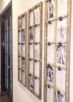 a hallway with pictures hanging on the wall