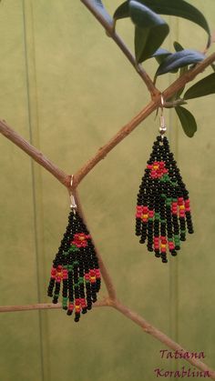 "These handmade author's earrings are made of high-quality Czech beads and strong synthetic thread. In these unique earrings I use my author's scheme Abstract flowers minimalism .They are elegant, fashionable, and highly versatile, suitable for everyday wear. Color: base color- black and other colors(cherry, burgundy, yellow, green). 100% hand made with love! Measurements: Length- about 6,5 cm( 2,56\") ,Width -2 cm (0,79\") Materials: Sterling silver components Czech glass beads Nylon Thread" Handmade Black Dangle Earrings, Black Dangle Flower Earrings With Ear Wire, Adjustable Black Flower Earrings, Adjustable Black Flower Earrings For Pierced Ears, Bohemian Black Flower Earrings For Gift, Unique Black Beaded Earrings With Dangling Beads, Unique Black Beaded Dangle Earrings, Black Flower-shaped Jewelry With Colorful Beads, Traditional Black Chandelier Earrings Gift