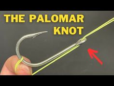 a hand holding a fishing hook with the words, the palomar knot