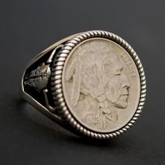 Splendid 925 Sterling Silver Signet Ring - Buffalo Skull Design. Hand-made. Antique style oxidized. The ring is set with a genuine US 1929 Indian Head Buffalo Nickel Coin, showing OBVERSE in front - Indian Head. Great detail, nice depth, and beautiful contrast. I designed and made the ring. The ring is NEW and never used.Ring size:  You need to pick a ring size from drop-down menuTarget: UnisexCoin year: 1929 Indian Head Buffalo NickelMaker's mark: JTStamped: 925I will be happy to combine shipme Horn Coral, Buffalo Skull, Buffalo Nickel, Indian Head, Silver Signet Ring, Silver Eagles, Skull Design, Silver Rings Handmade, Heart Jewelry