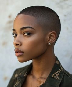 Undercut with Sleek Tapered Sides Round Face Shaved Head For Women, Shaving Hairstyles For African Ladies, Back Of Head Shaved Design Black Women, Undercuts For Black Women, Black Women With Short Hair, Girl Buzzcut Black Hair, Tapered Undercut, Easy Haircuts